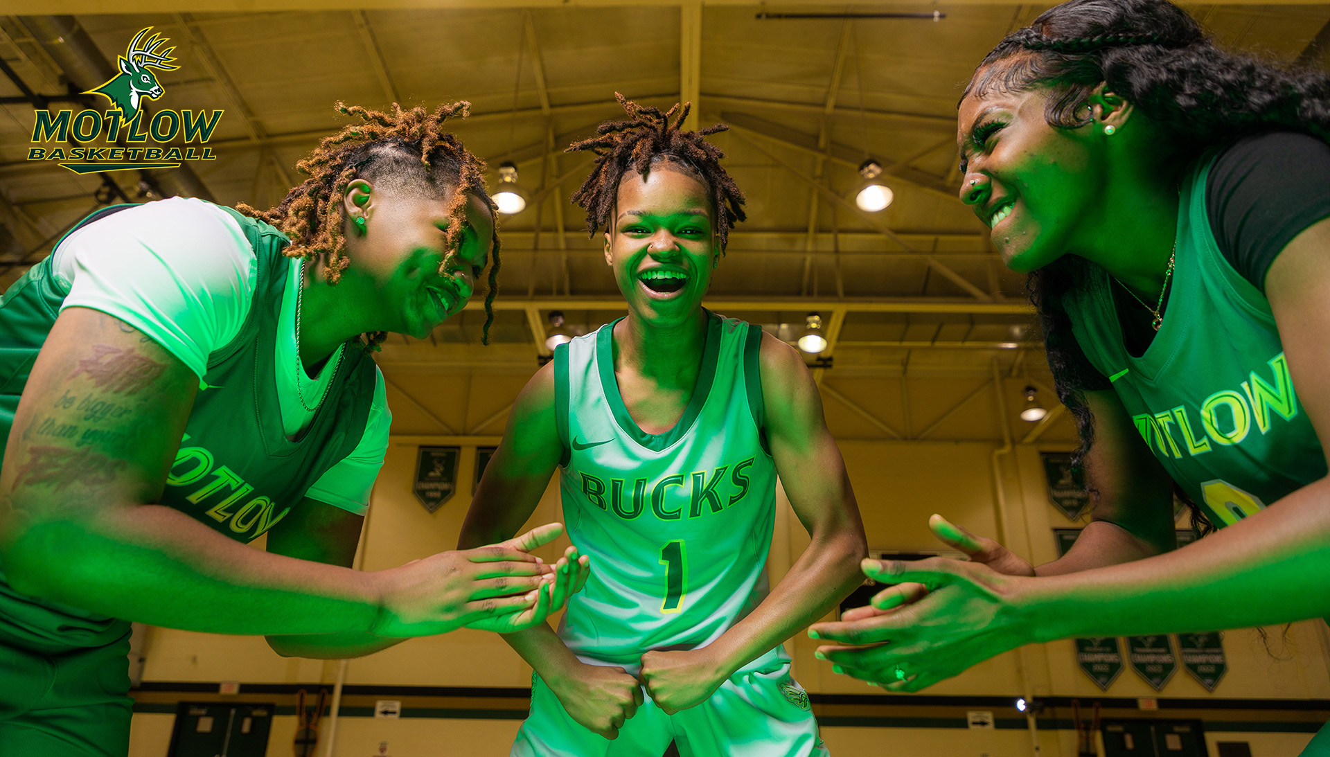 Three Motlow basketball players.